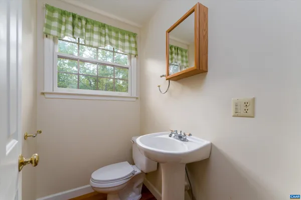 a bathroom with a sink and a toilet