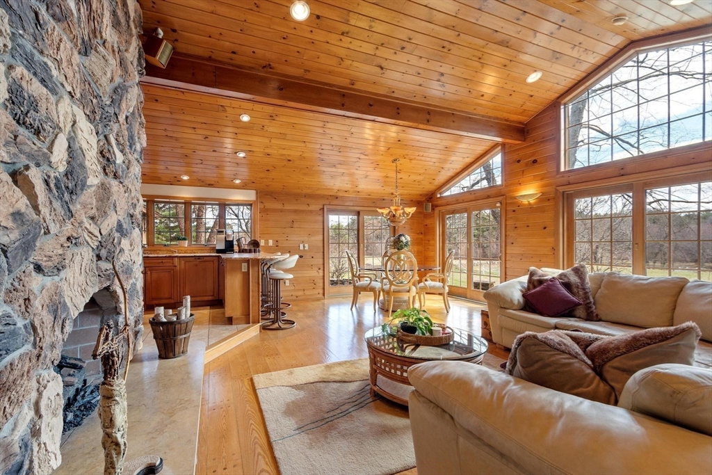 243 Concord Road Westford, MA 01886 - Photo 7 of 42 a living room with furniture and a large window