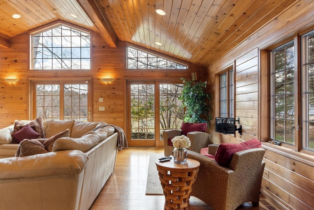 243 Concord Road Westford, MA 01886 - Photo 8 of 42 a living room with furniture a large window with outer view