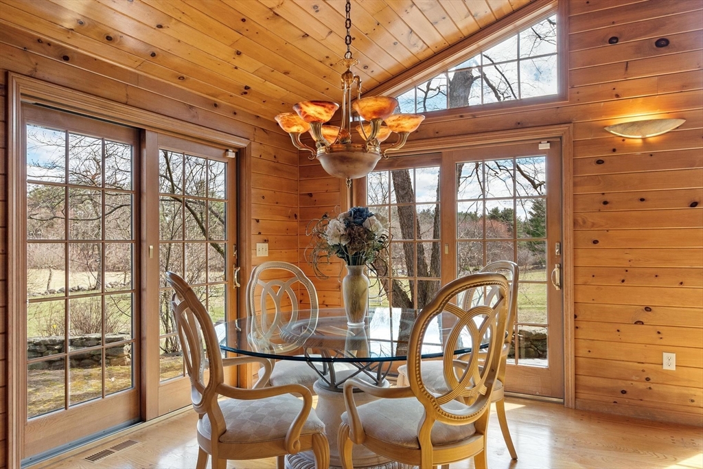 243 Concord Road Westford, MA 01886 - Photo 10 of 42 a view of a dining room with furniture window and outside view