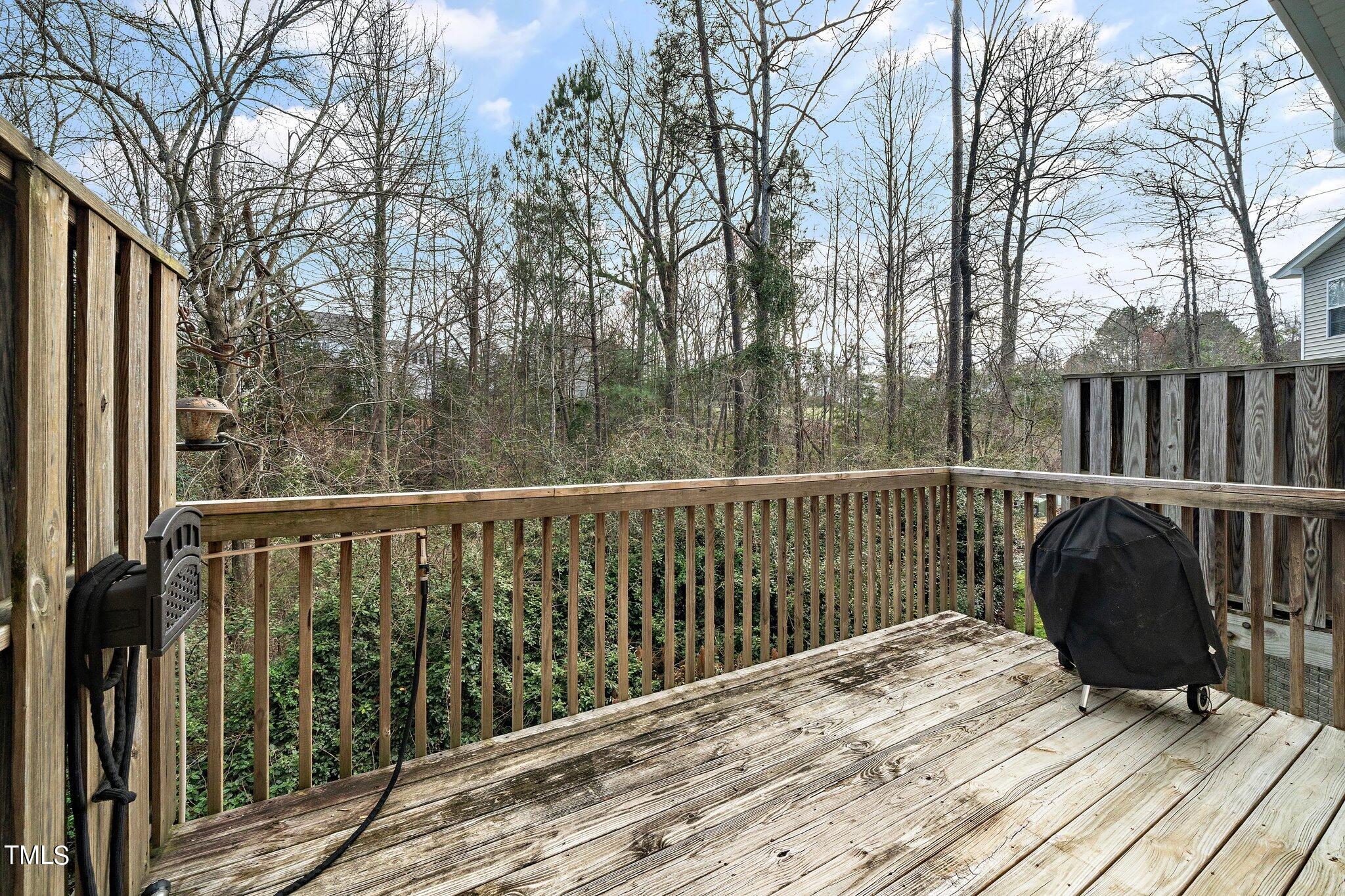 4602 Centrebrook Circle Raleigh, NC 27616 - Photo 19 of 24 a view of balcony with wooden floor and fence