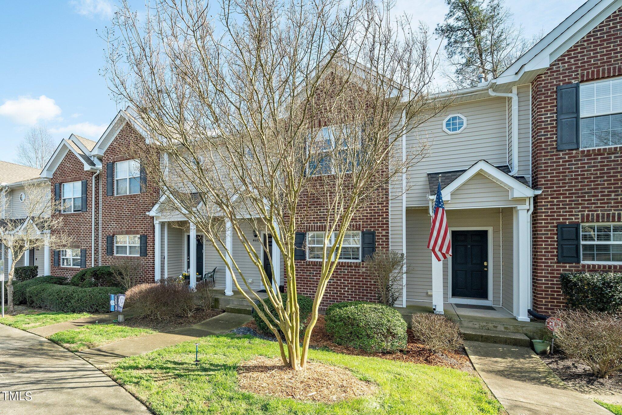 4602 Centrebrook Circle Raleigh, NC 27616 - Photo 3 of 24 a front view of a house with garden