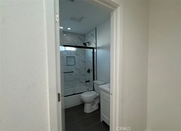 a backyard of a house with seating space