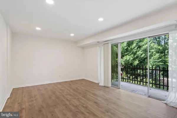 a view of a room with a large window