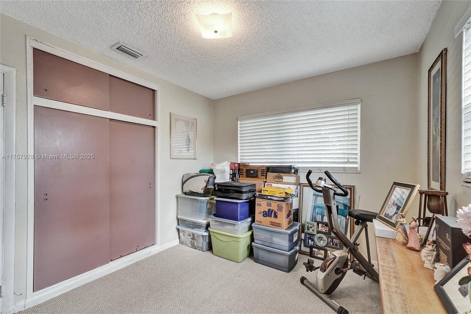 534 West 53rd Terrace Hialeah, FL 33012 - Photo 21 of 34 a view of a dining room with furniture and a window