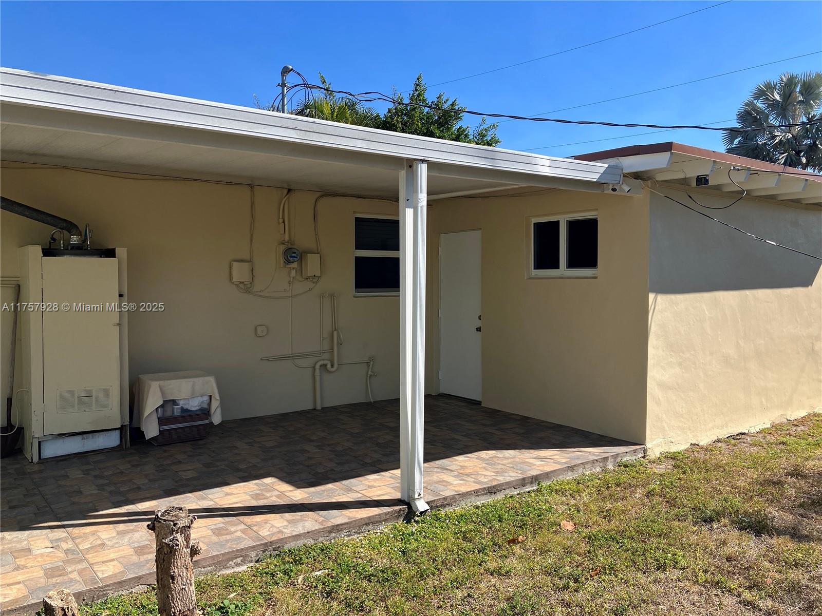 534 West 53rd Terrace Hialeah, FL 33012 - Photo 30 of 34 a view of a house with backyard