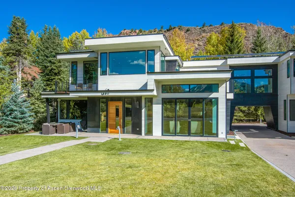 front view of a house with a swimming pool