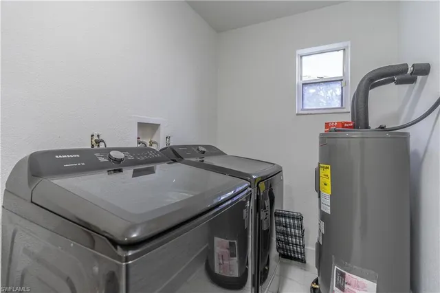 a view of a swimming pool and deck in the backyard