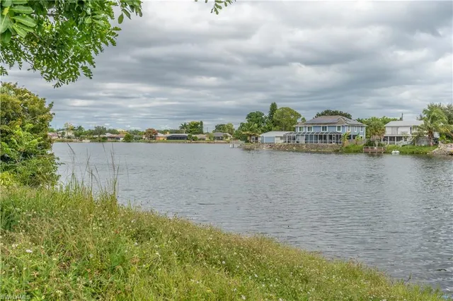 a aerial view of a house with a yard