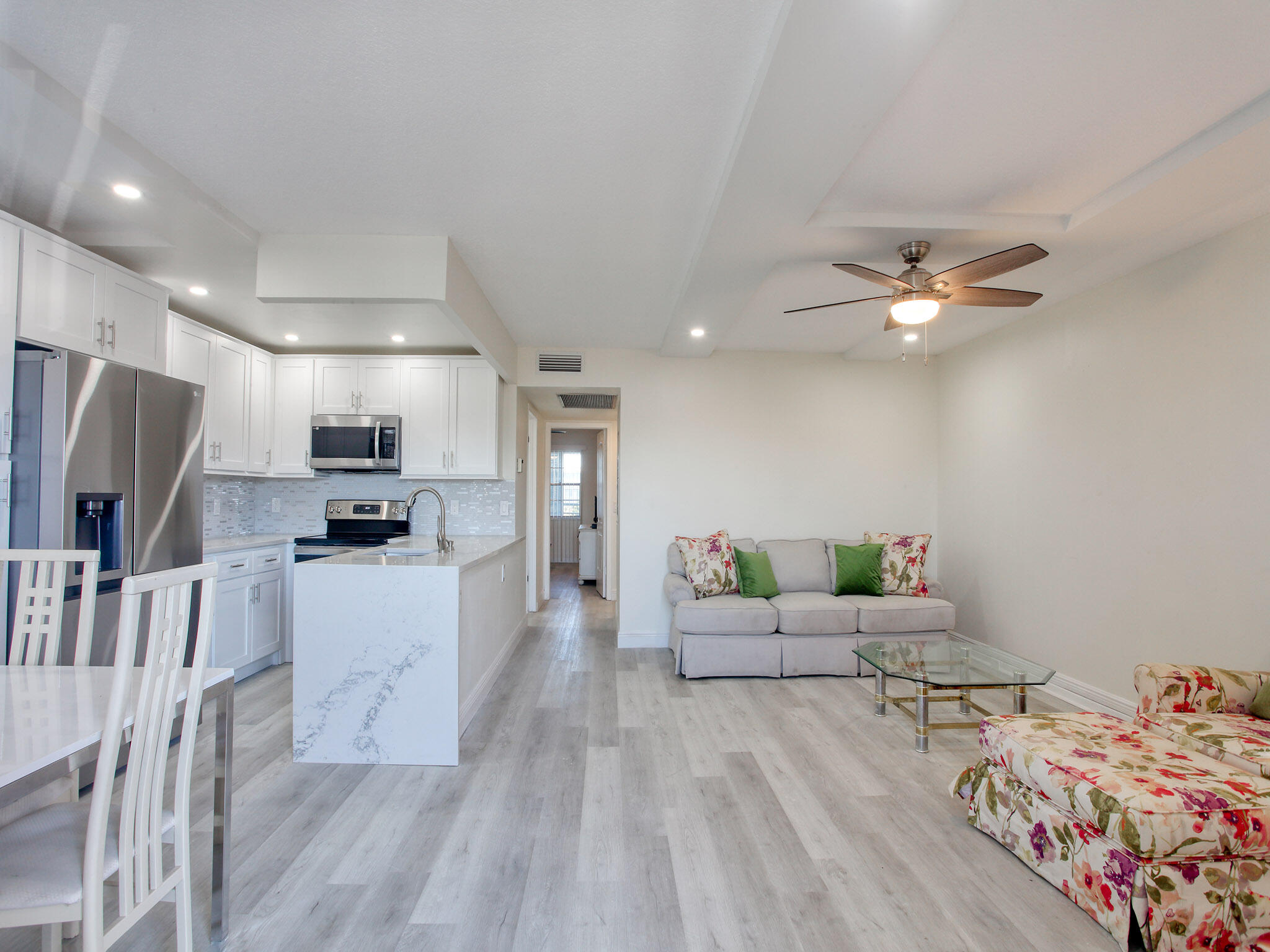 3047 Guildford East, Unit C Boca Raton, FL 33434 - Photo 5 of 50 LIVING ROOM KITCHEN