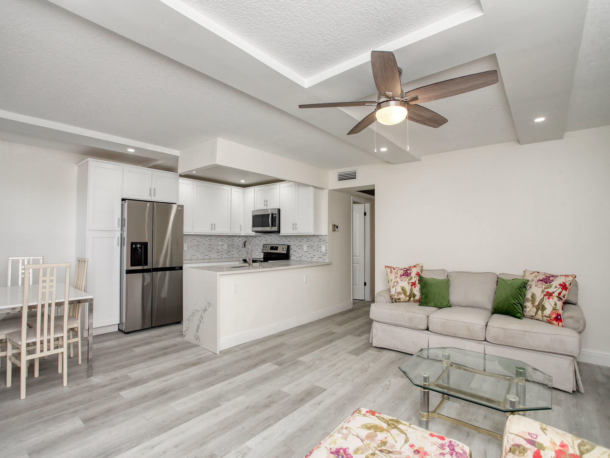 3047 Guildford East, Unit C Boca Raton, FL 33434 - Photo 7 of 50 KITCHEN AND LIVING ROOM