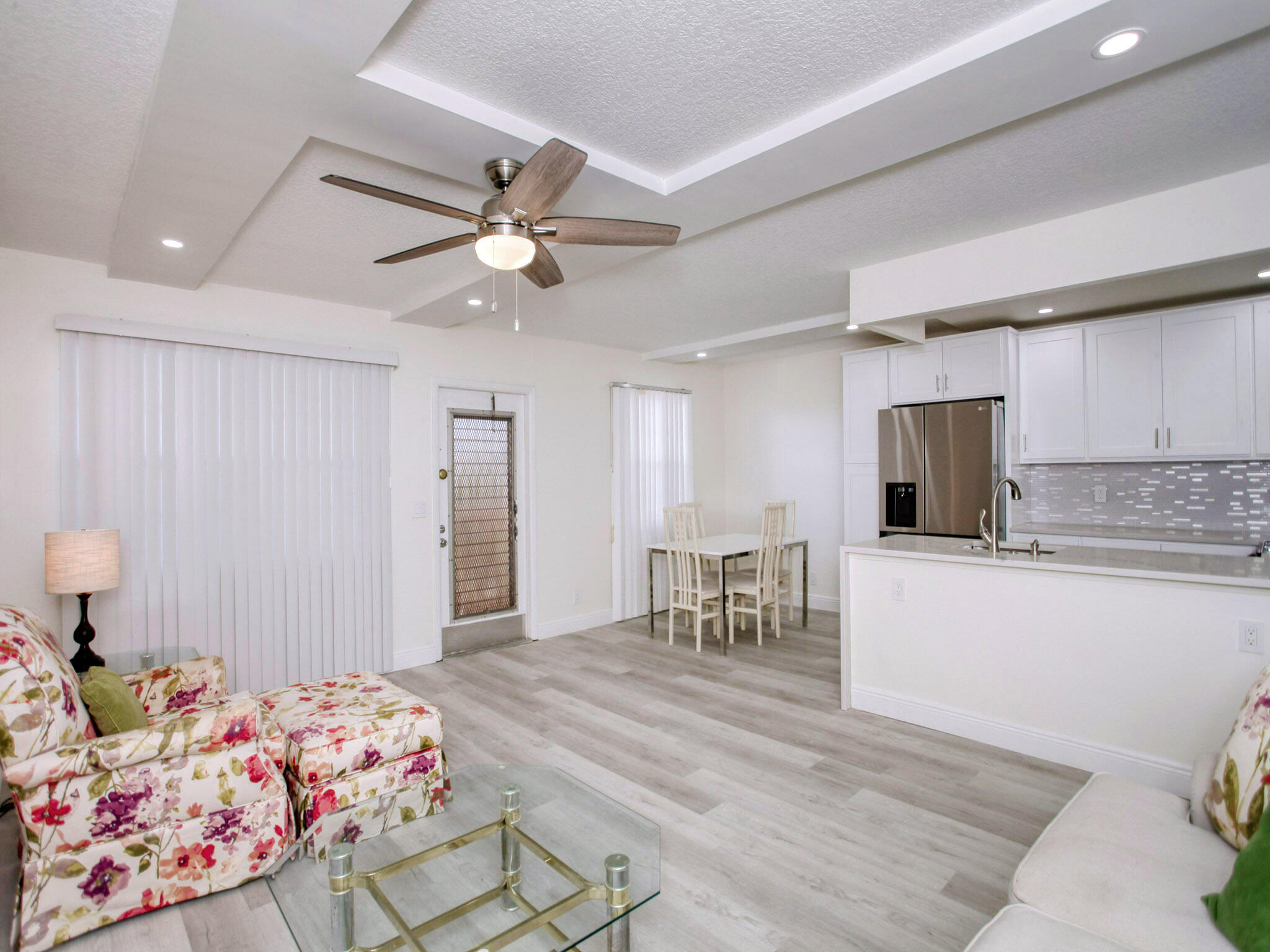 3047 Guildford East, Unit C Boca Raton, FL 33434 - Photo 9 of 50 LIVING ROOM AND KITCHEN