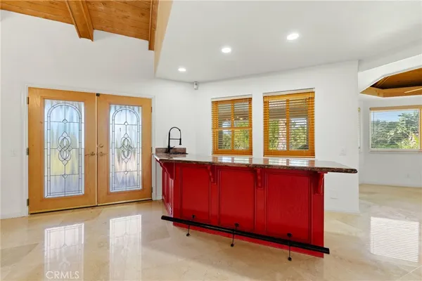 a view of a livingroom with a window and a fireplace