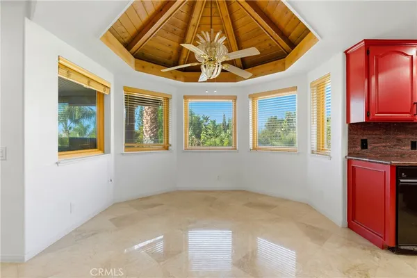 a kitchen with kitchen island granite countertop lots of stainless steel appliances granite countertop lots of counter top space and cabinets