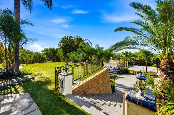 a backyard of a house with lots of green space