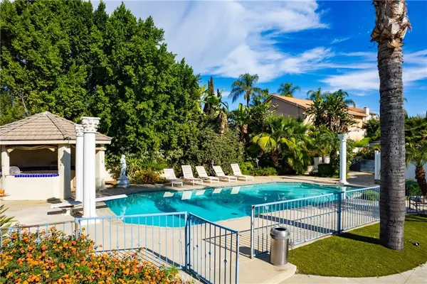a view of swimming pool with a garden