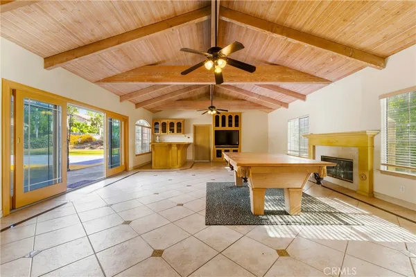 a kitchen with a sink and a refrigerator