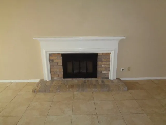 a kitchen with a sink stove and microwave