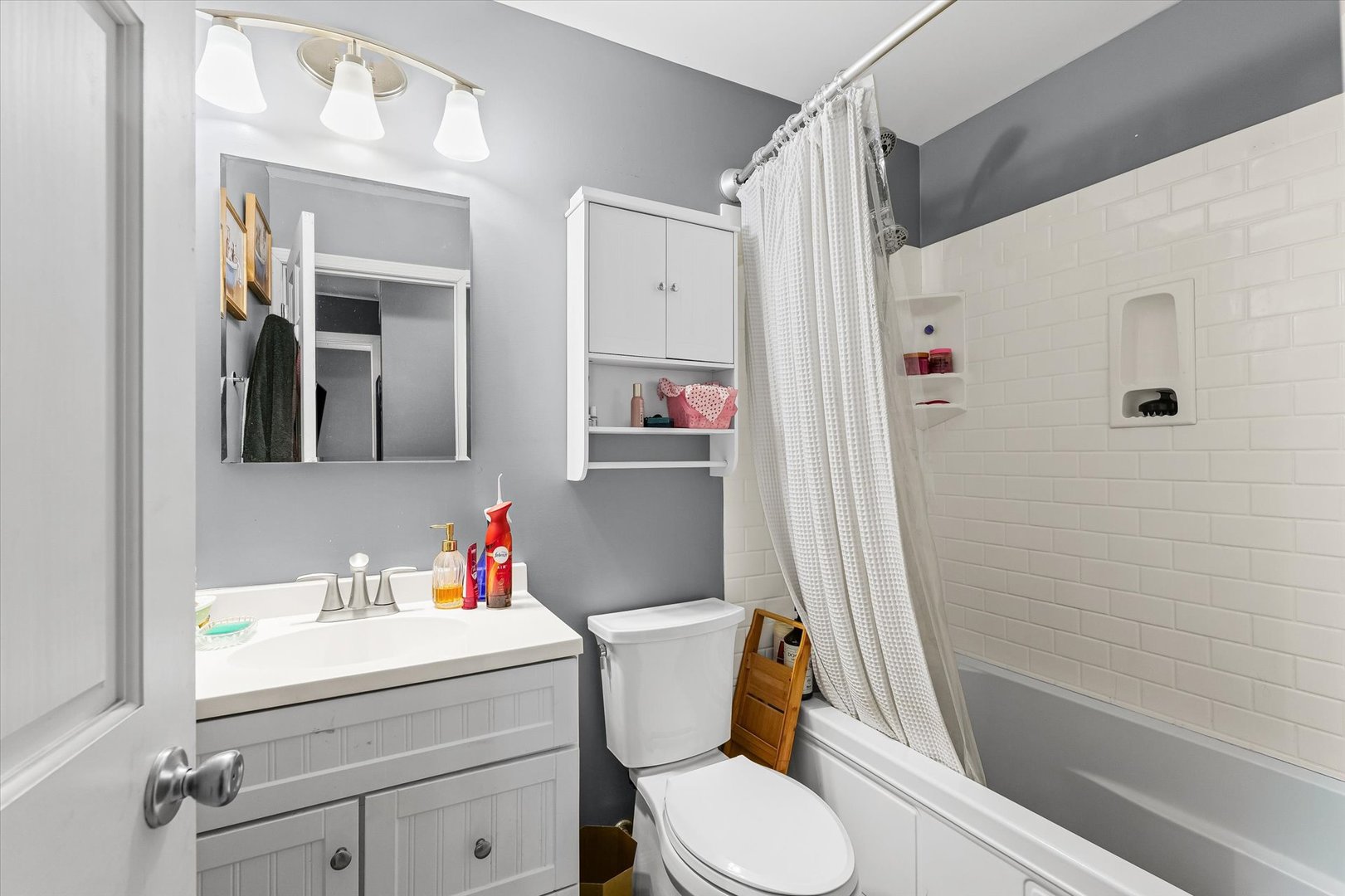 1715 Phillippe Drive Mahomet, IL 61853 - Photo 16 of 30 a bathroom with a sink toilet and shower