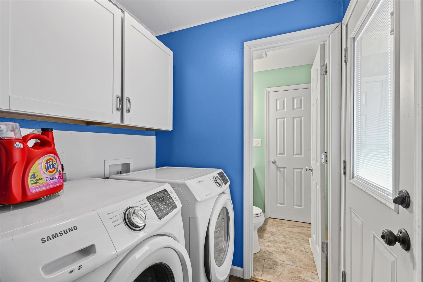 1715 Phillippe Drive Mahomet, IL 61853 - Photo 23 of 30 a utility room with dryer and washer