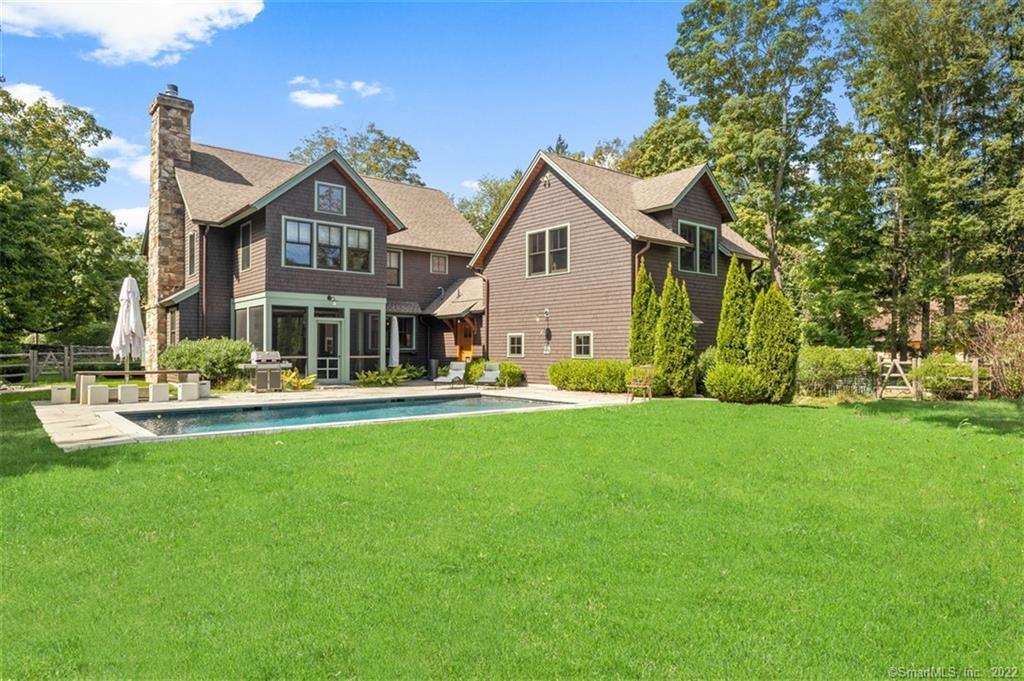210 Belden Hill Road Wilton, CT 06897 - Photo 1 of 1 a front view of house with yard and green space