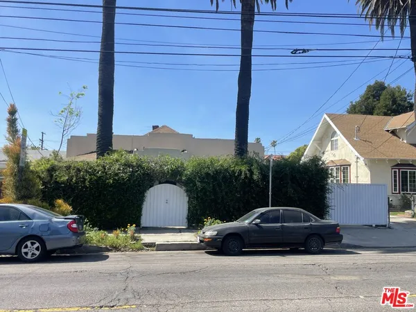 a car parked in front of a house