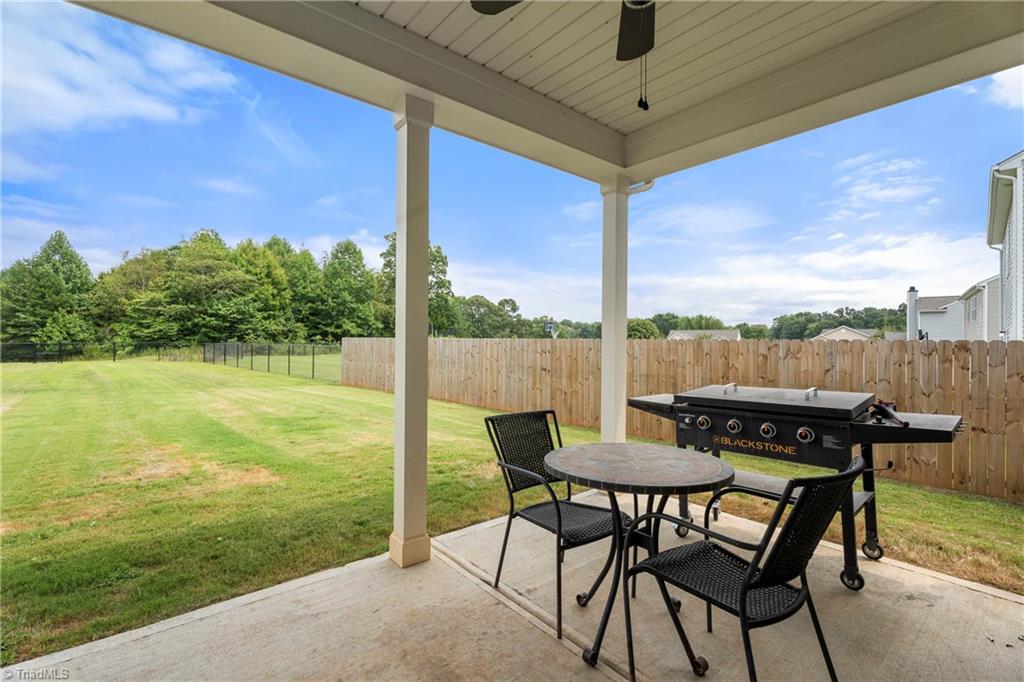 5303 Murray Road Winston-Salem, NC 27106 - Photo 42 of 44 Covered back porch and fully fenced back yard