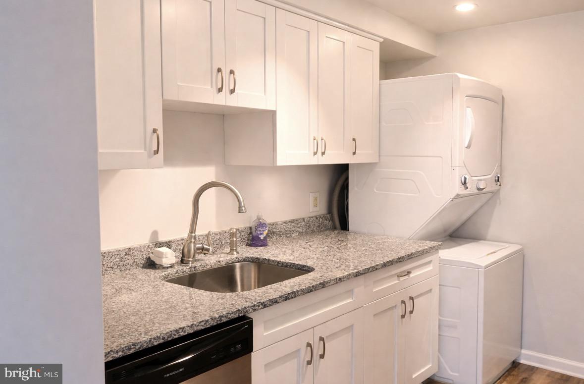 8503 Falls Run Road, Unit B Ellicott City, MD 21043 - Photo 8 of 23 Modern laundry space with sleek design.