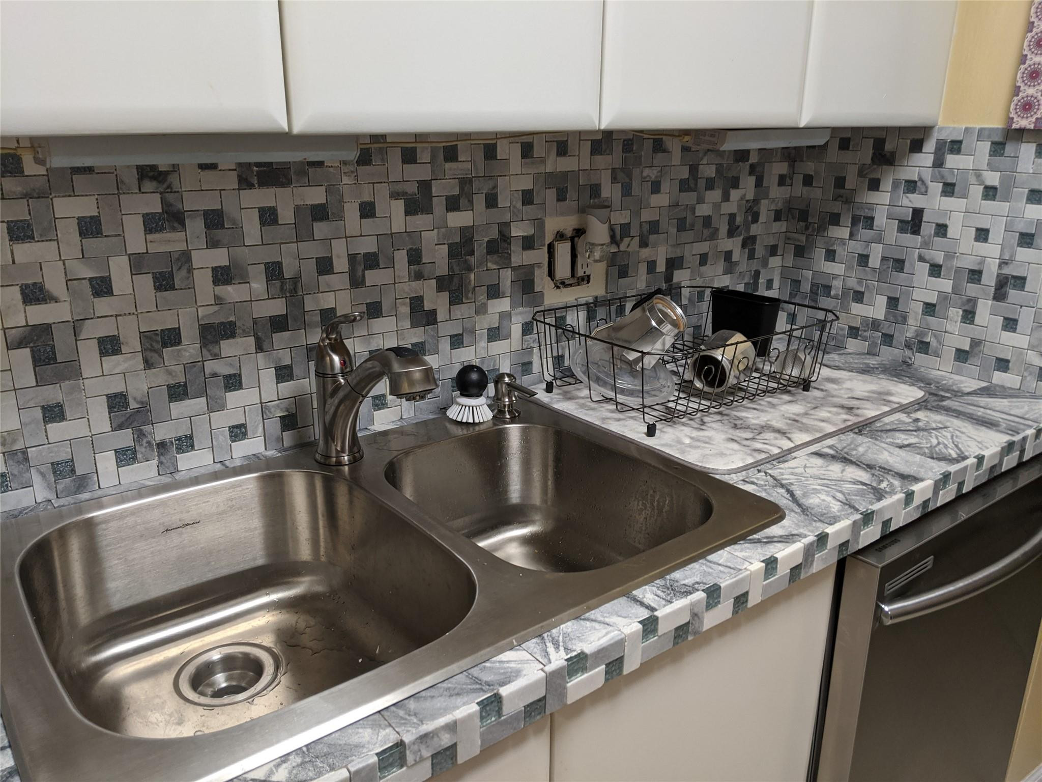 3760 Inverrary Drive, Unit 3L Lauderhill, FL 33319 - Photo 7 of 10 a close view of sink a granite counter top