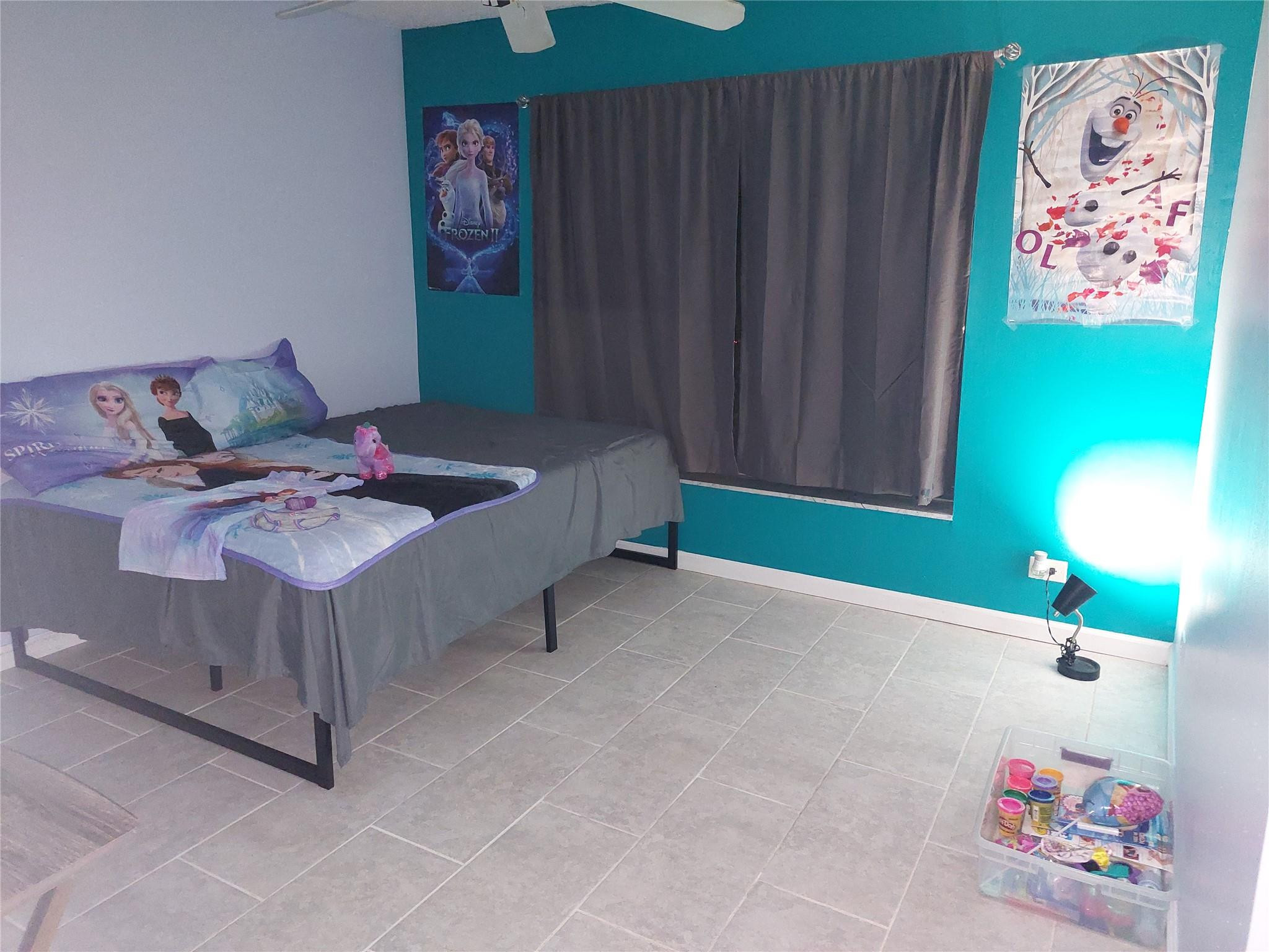 3760 Inverrary Drive, Unit 3L Lauderhill, FL 33319 - Photo 8 of 10 a living room with furniture and a window