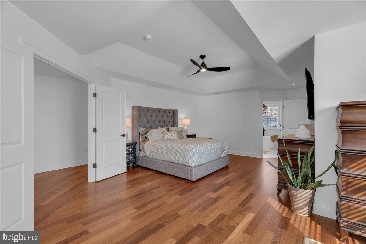 425 Peltoma Road Haddonfield, NJ 08033 - Photo 16 of 33 a bedroom with furniture and wooden floor