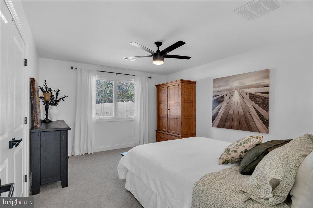 425 Peltoma Road Haddonfield, NJ 08033 - Photo 20 of 33 a bedroom with a bed and painting on the wall
