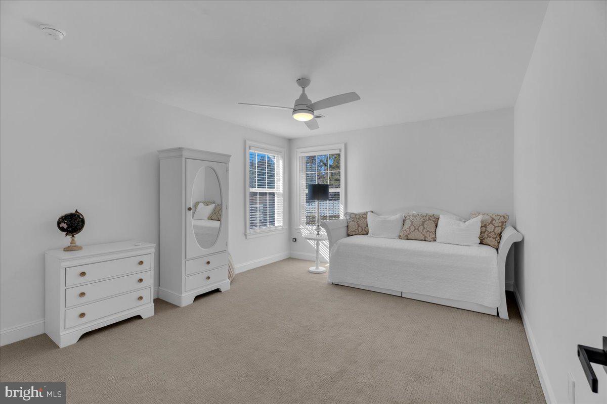 425 Peltoma Road Haddonfield, NJ 08033 - Photo 22 of 33 a living room with furniture and chandelier