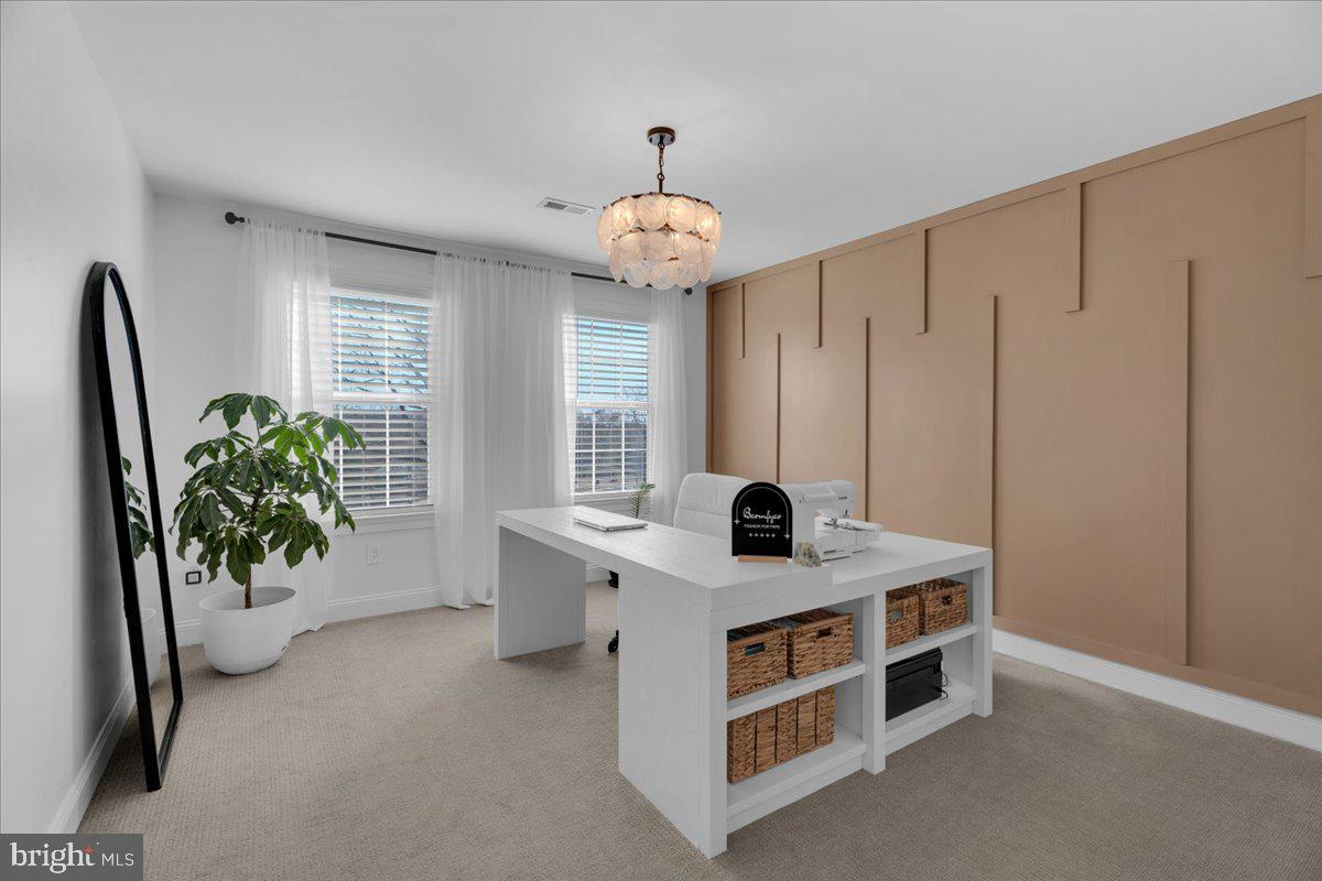 425 Peltoma Road Haddonfield, NJ 08033 - Photo 23 of 33 a view of a workspace with furniture and a window