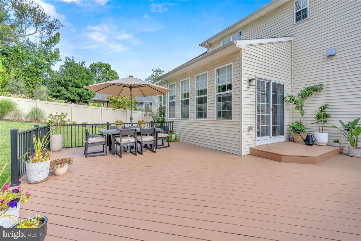 425 Peltoma Road Haddonfield, NJ 08033 - Photo 29 of 33 a view of a patio with table and chairs and potted plants