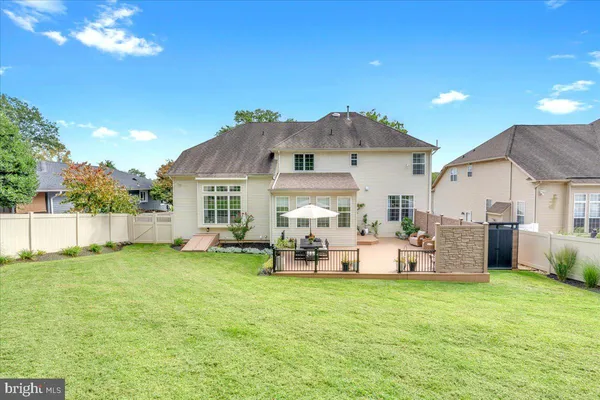 aerial view of a house with a swimming pool