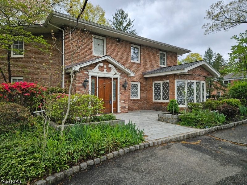 218 Devon Road Essex Fells, NJ 07021 - Photo 18 of 23 front view of a house