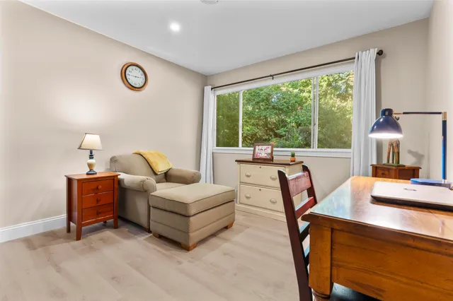 a living room with furniture and a table