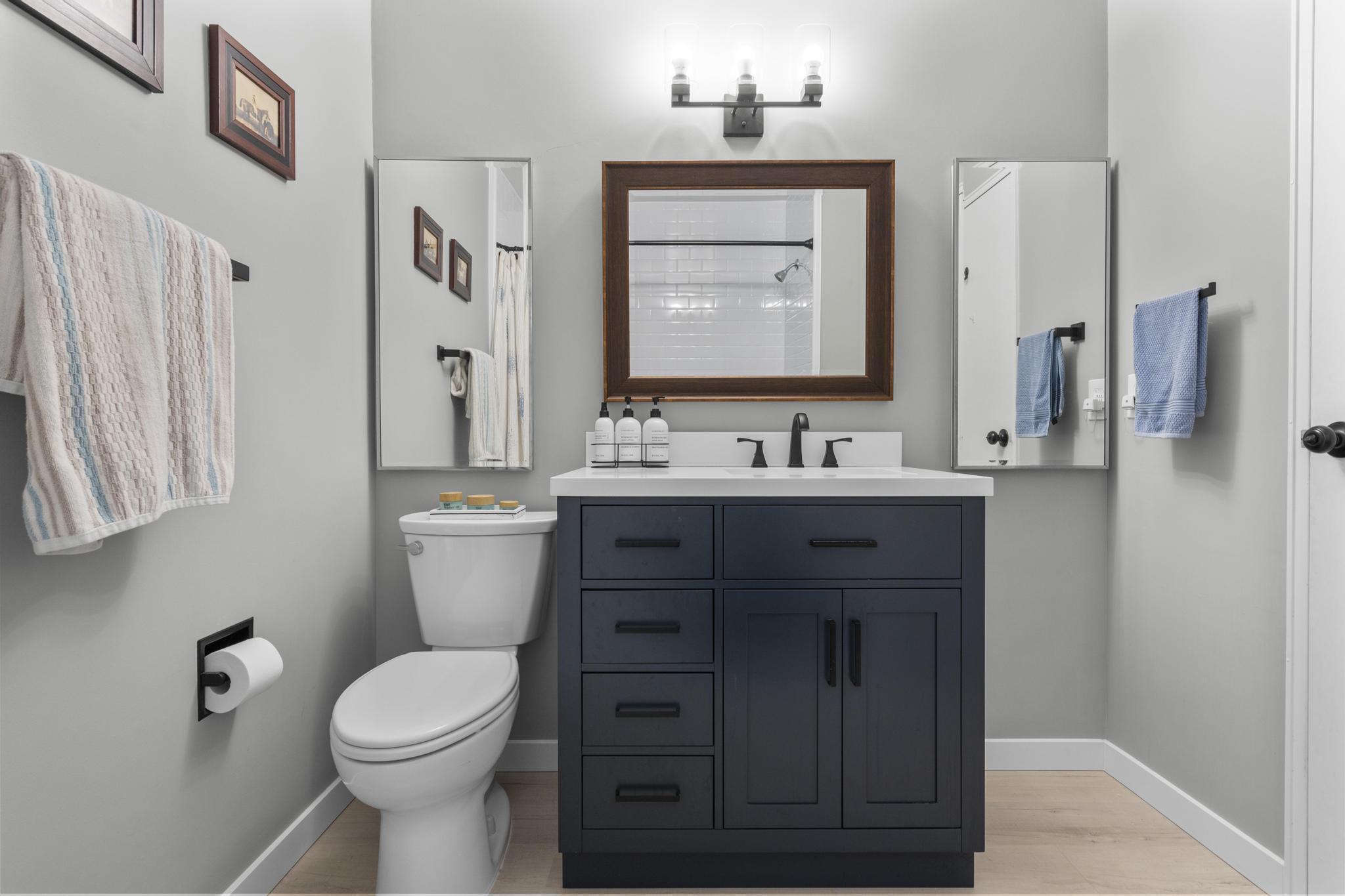 28 Mill Hill Road, Unit 28 Fairfield, CT 06890 - Photo 27 of 37 a bathroom with a toilet sink and mirror