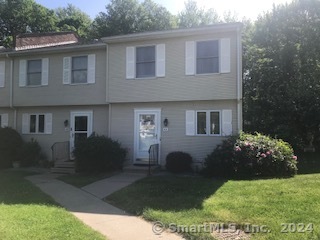 288 Broad Brook Road, Unit 4A Enfield, CT 06082 - Photo 1 of 1 a front view of a house with garden