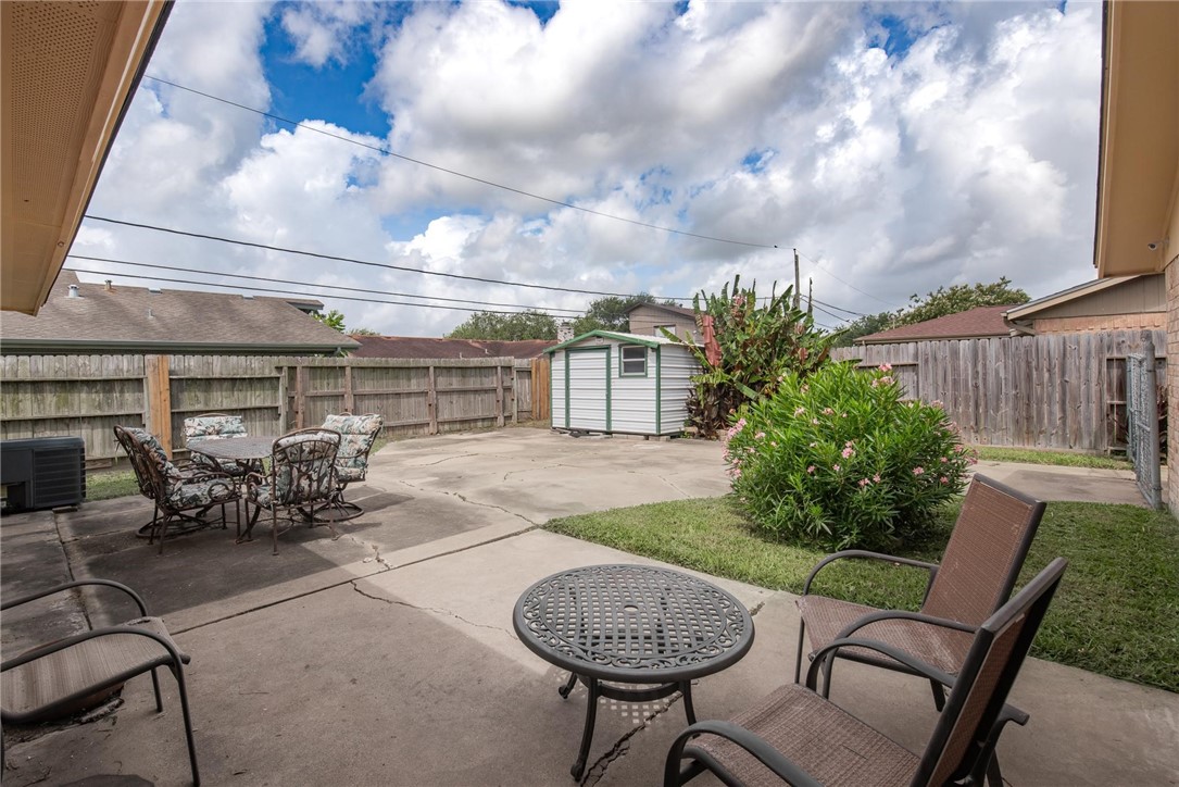 4957 Shadowbend Drive Corpus Christi, TX 78413 - Photo 11 of 35 a view of a chairs and table in the patio