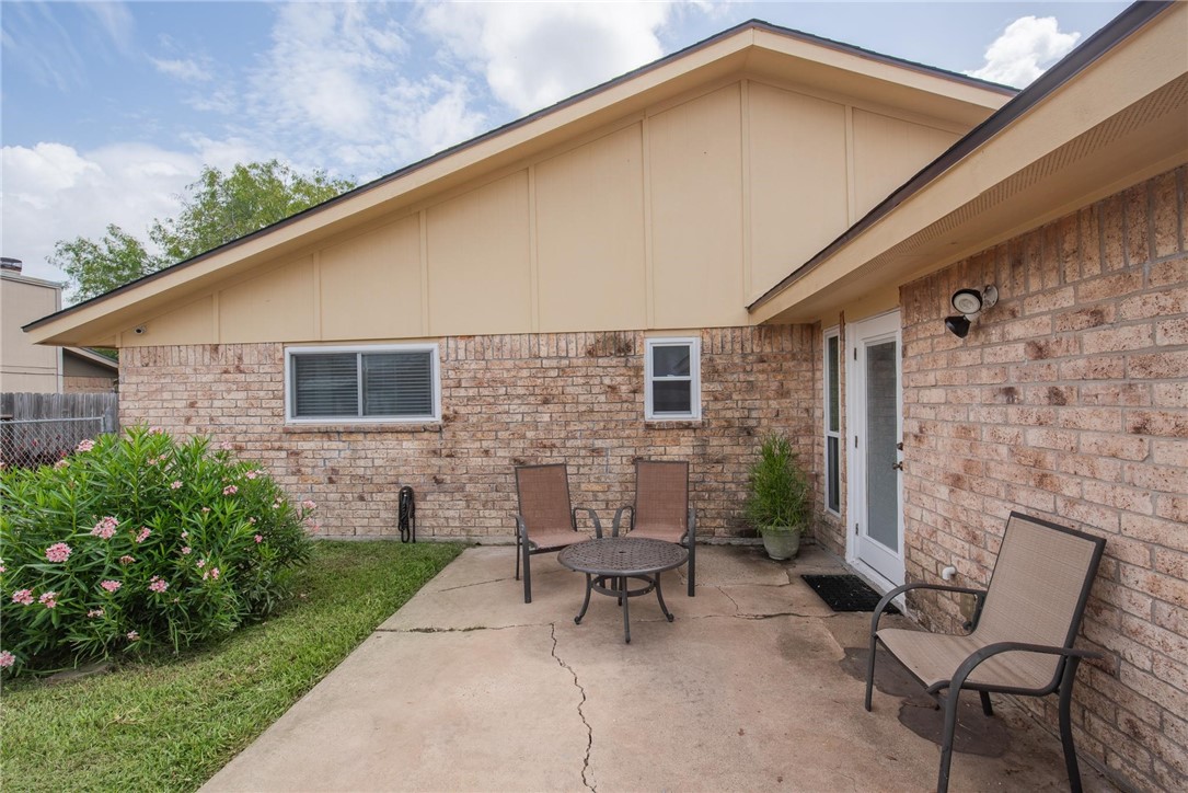 4957 Shadowbend Drive Corpus Christi, TX 78413 - Photo 10 of 35 a backyard of a house with outdoor seating