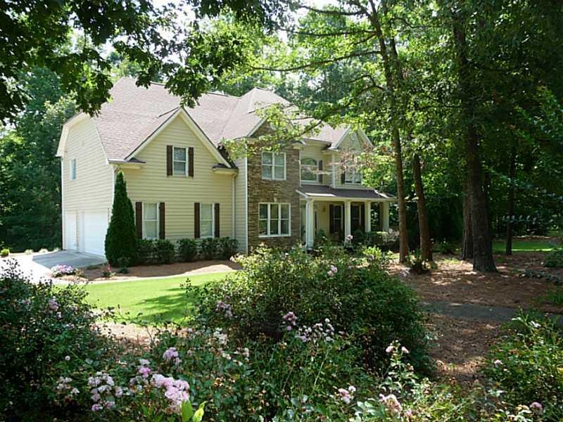 100 Rose Ridge Drive Canton, GA 30115 - Photo 1 of 1 Exterior Front. Charming Home offers elegant living on a private beautifully landscaped 2.7 + acres.