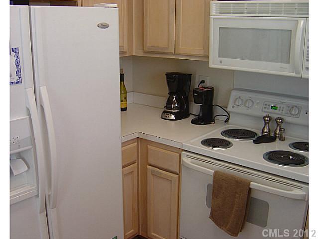 10118 Faires Farm Road Charlotte, NC 28213 - Photo 7 of 13 a kitchen with a sink and cabinets