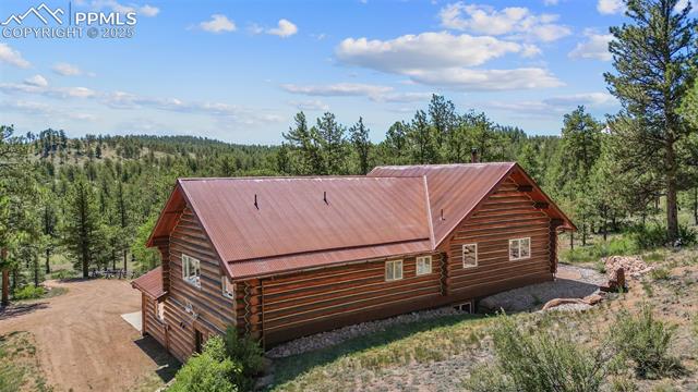 35 Toms Ranch Rd Lake Lake George, CO 80827 - Photo 49 of 50 Birds eye view of back of log home with mountain view