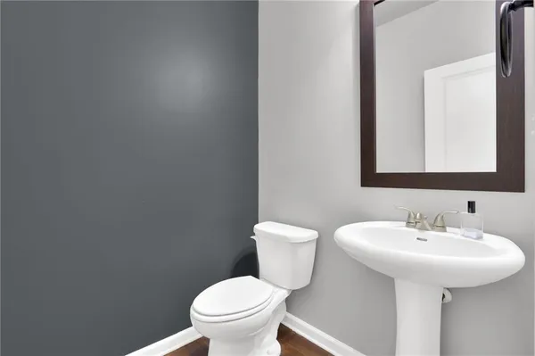 a bathroom with a sink and a toilet