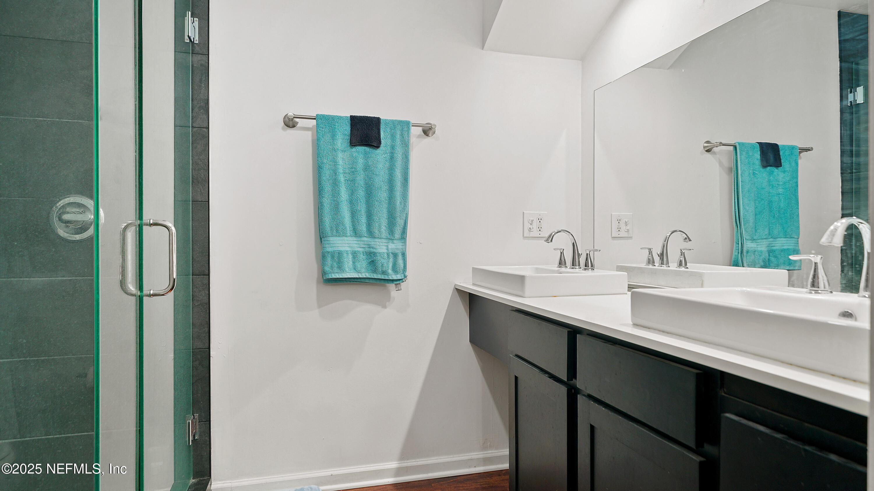 10555 Rutgers Road Jacksonville, FL 32218 - Photo 12 of 25 a bathroom with a sink and a mirror