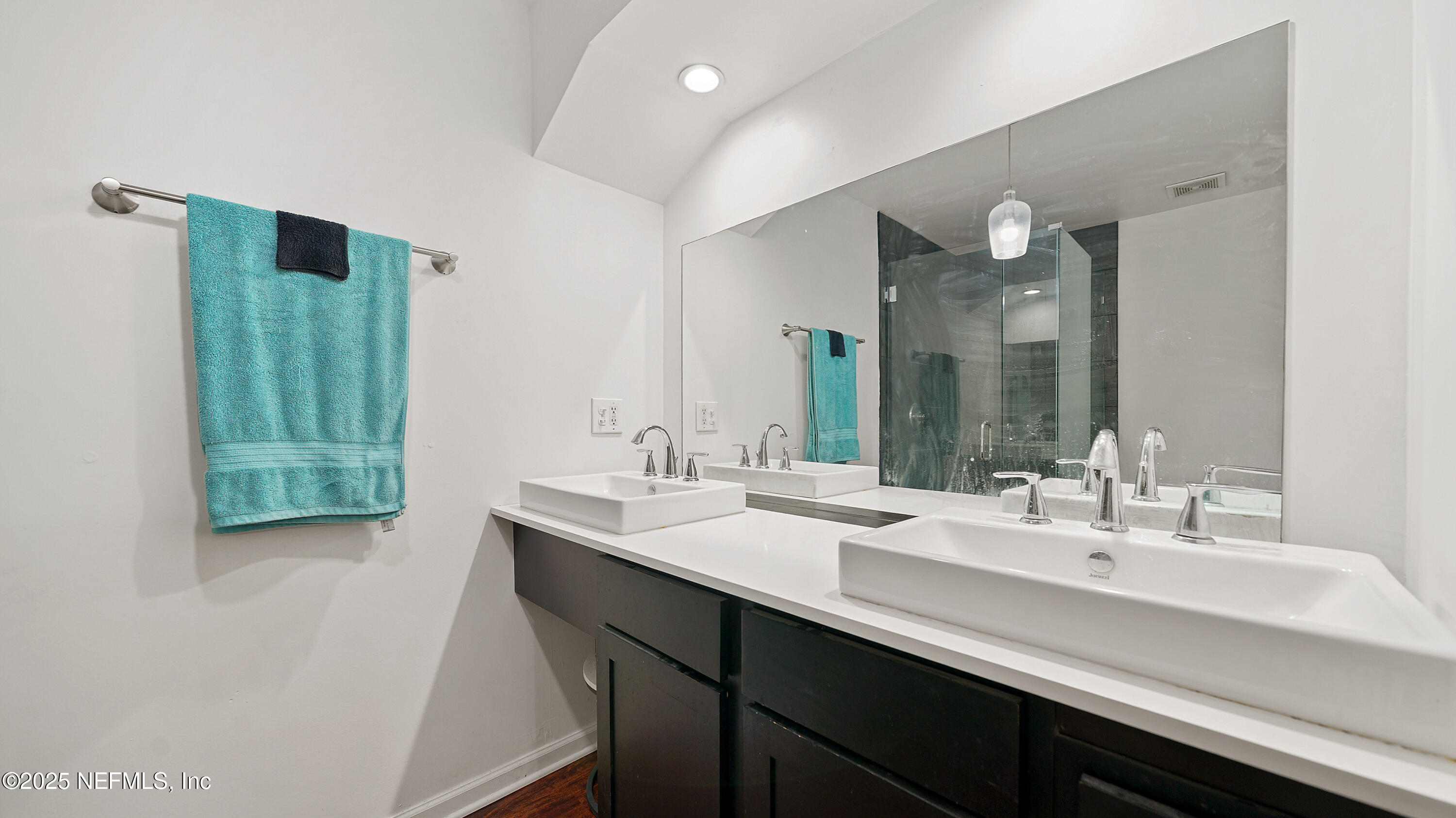 10555 Rutgers Road Jacksonville, FL 32218 - Photo 13 of 25 a bathroom with 2 sink and a mirror
