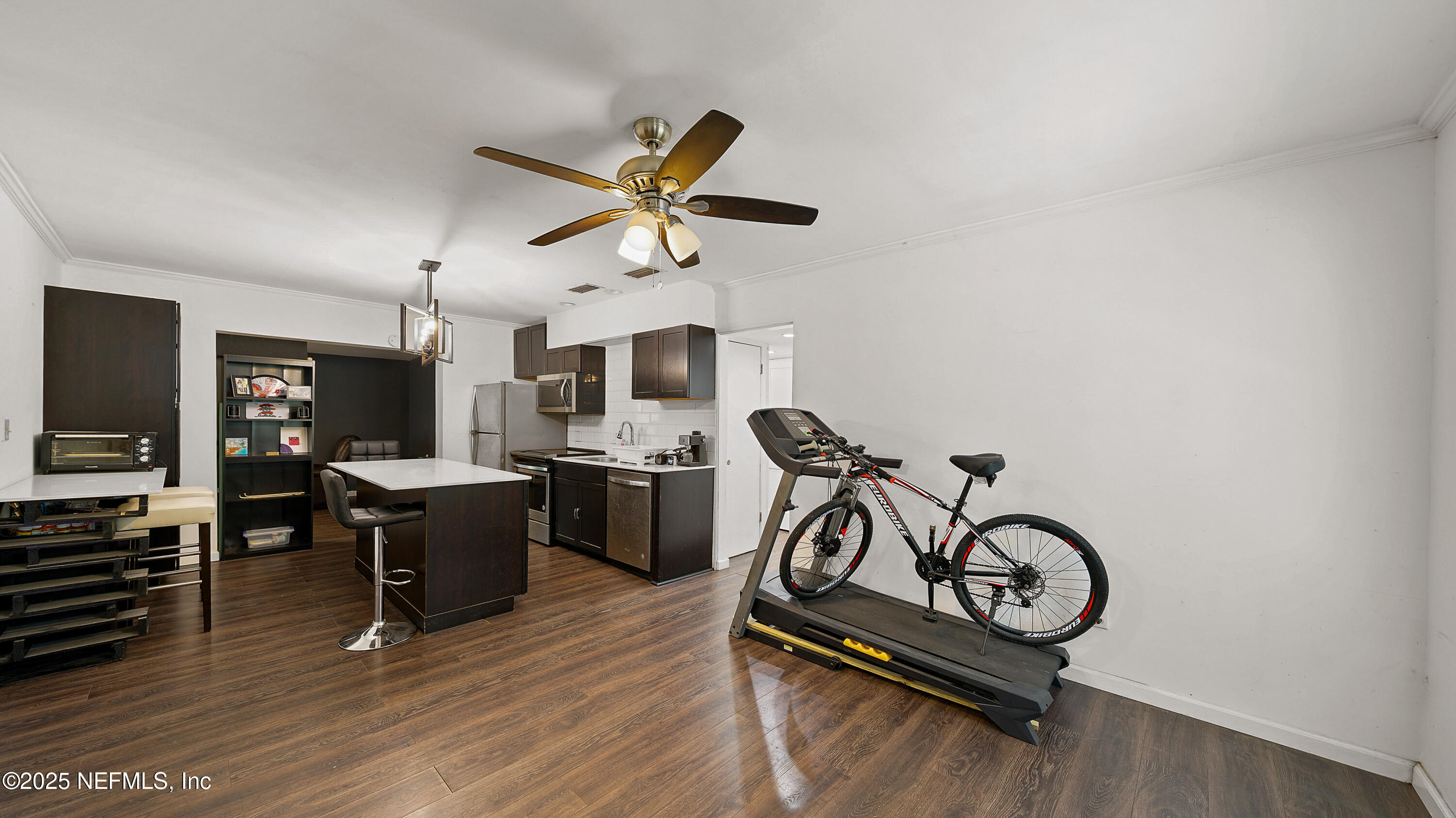 10555 Rutgers Road Jacksonville, FL 32218 - Photo 2 of 25 a view of a workspace with furniture and a window