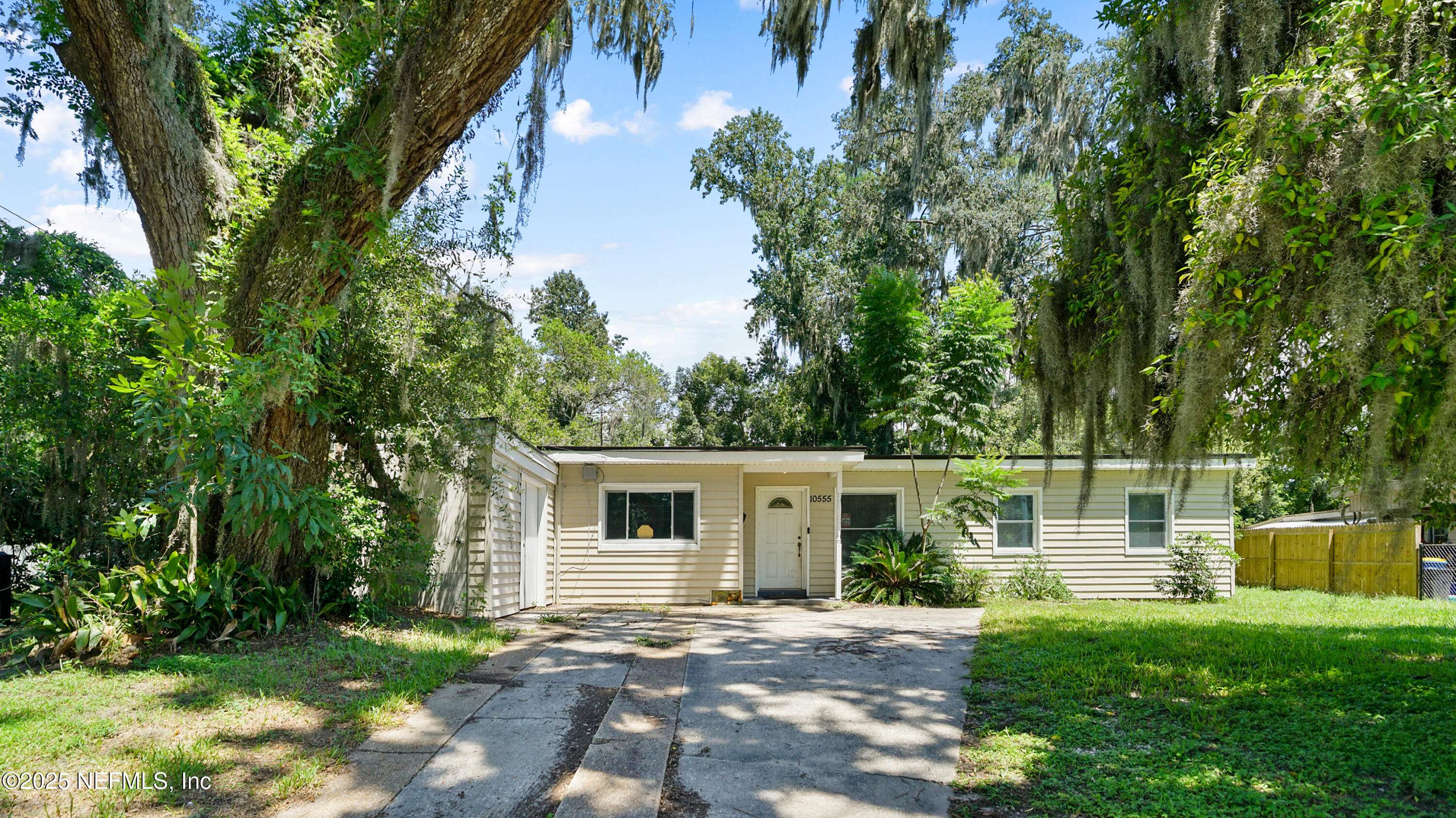 10555 Rutgers Road Jacksonville, FL 32218 - Photo 24 of 25 front view of a house with a yard